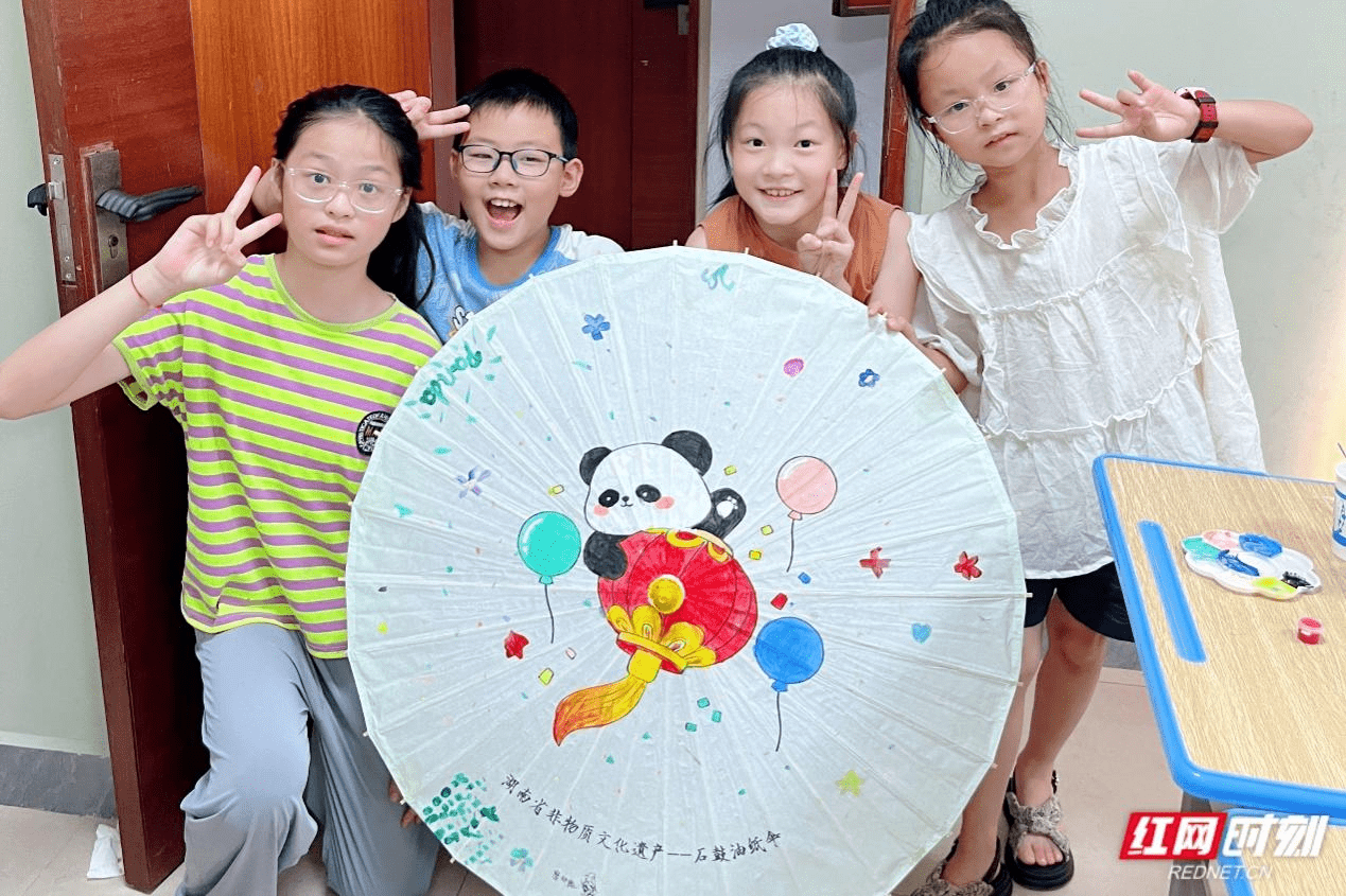 组图丨手绘石鼓油纸伞 湘潭这个暑期托管很有“趣”:油纸伞